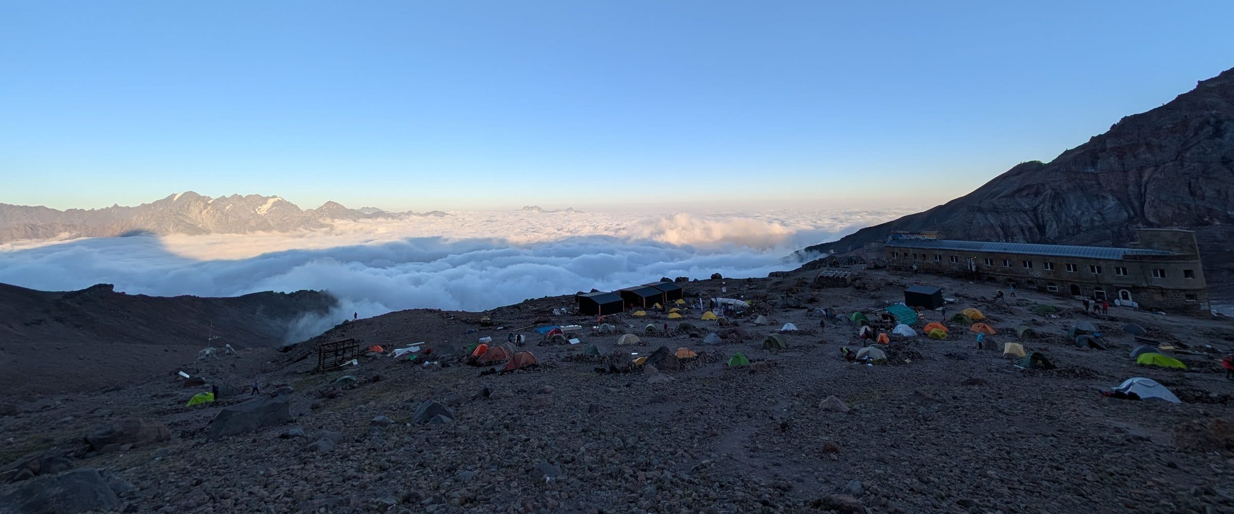 First light over a sea of clouds from a high camp in the Georgian Caucasus