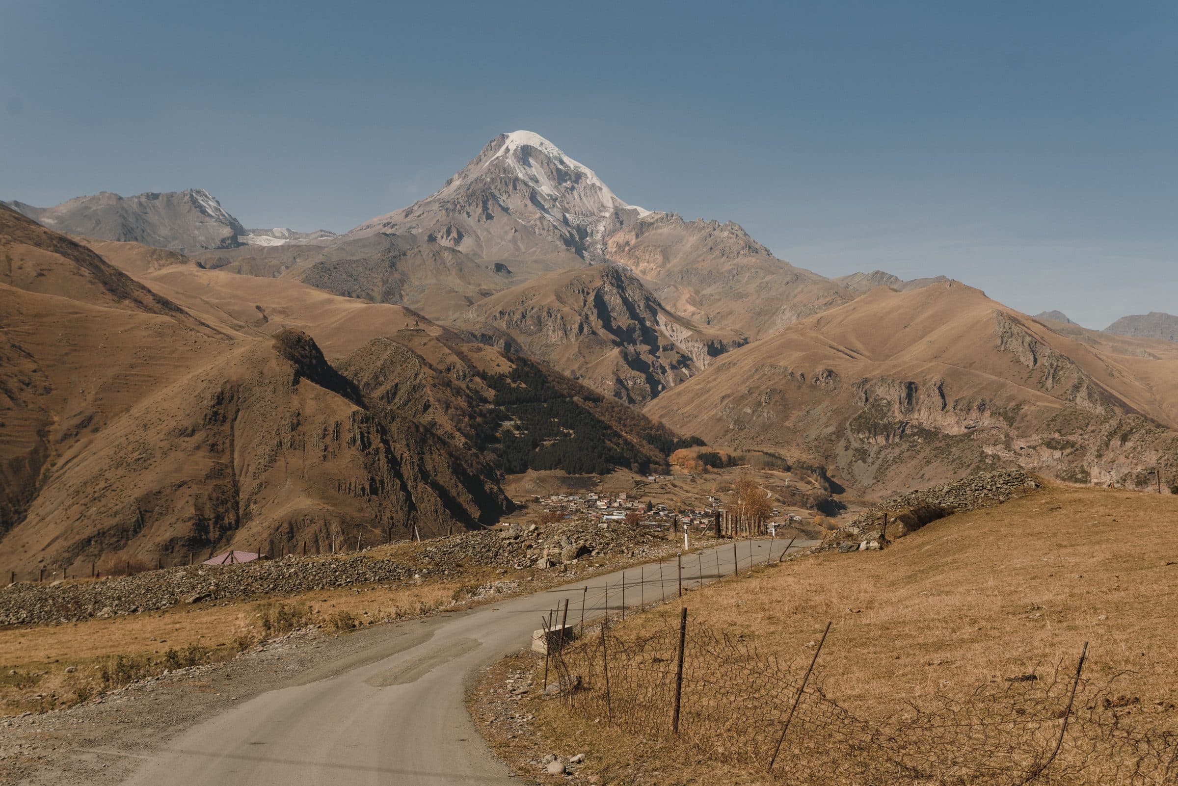 Snow-capped Mount Kazbek above the mountain road to Stepantsminda